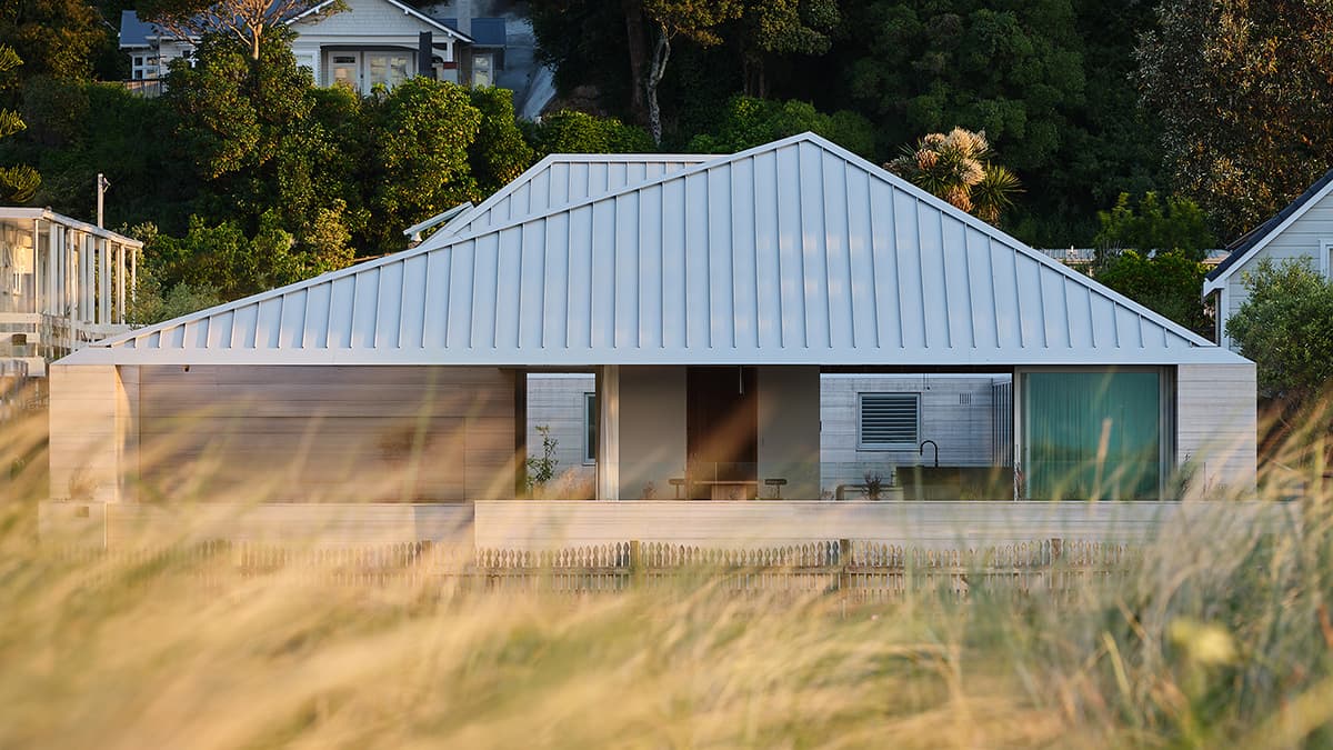 Architectural house among sand dunes