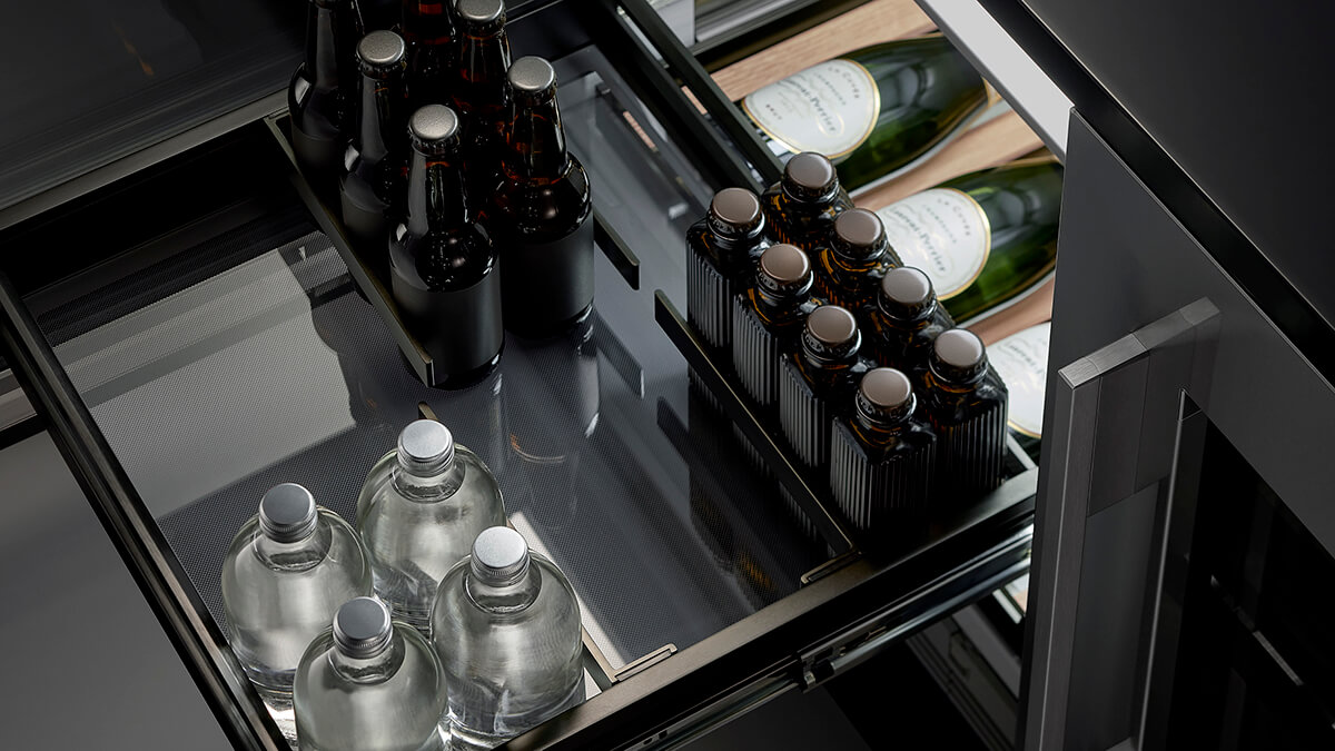 Wine bottles being served at the ideal temperature from a wine cabinet
