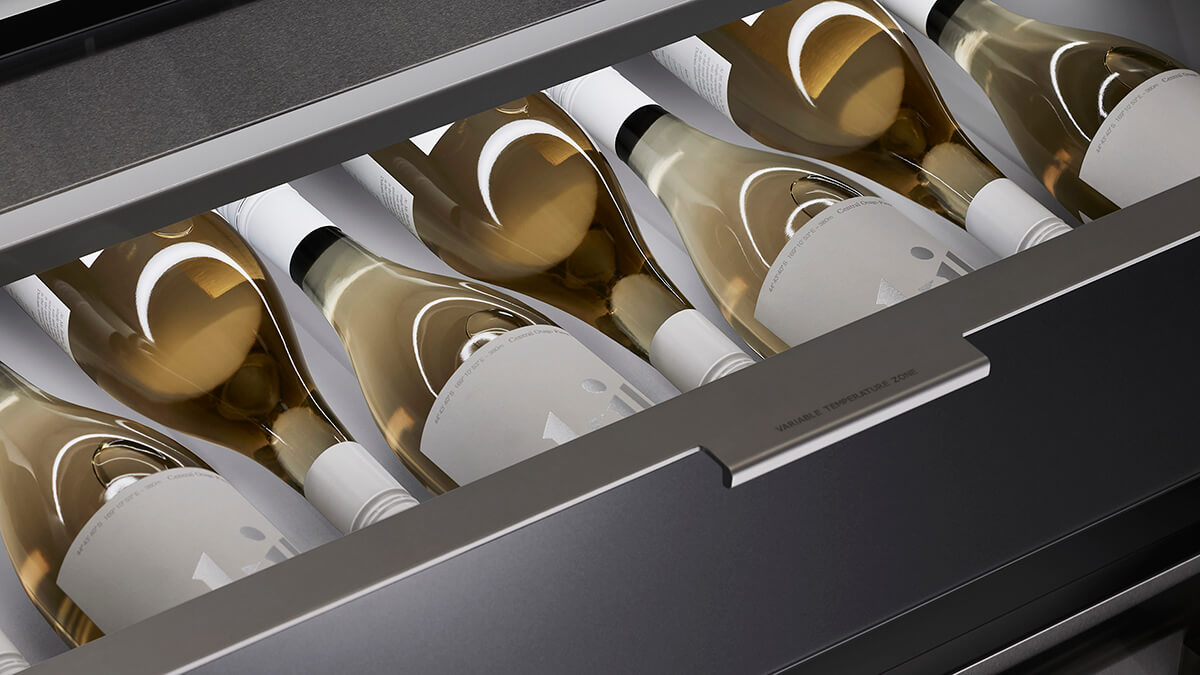 Internal view of a refrigerator showing fresh ingredients and stable temperature zones